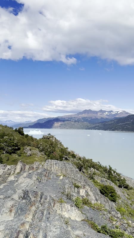 Video from the rocks above Lago Grey, icebergs drifting on the pale water below the mountains